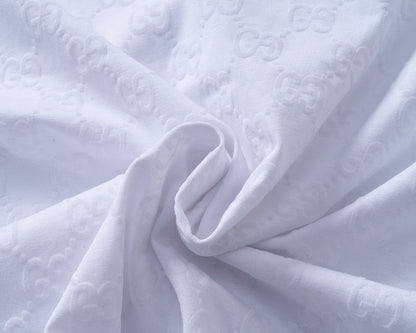 GUC Embossed GG Monogram Tee 25083